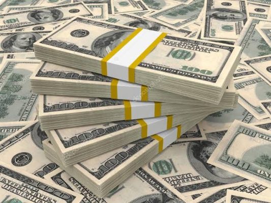 Tumpukan uang dolar